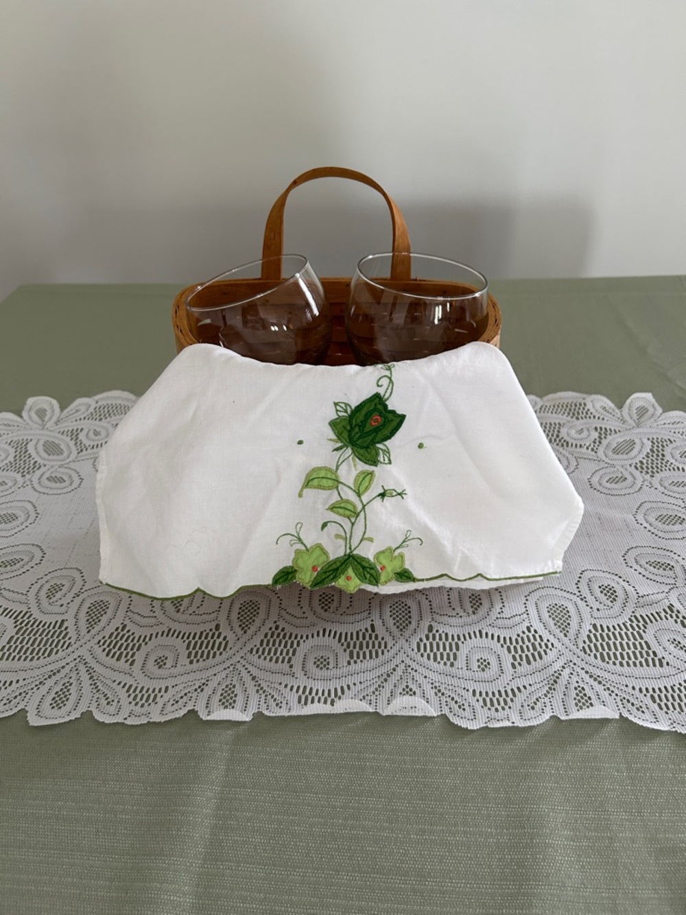 Vintage basket with 2 wine glasses and embroidered tea towel see description